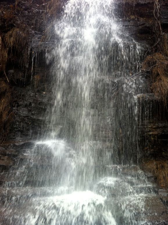 A beautiful waterfall at the side of H138